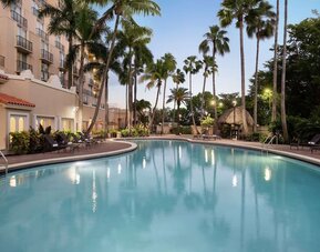 Outdoor pool at Embassy Suites By Hilton Miami - International Airport.