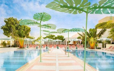 Beautiful outdoor pool with lounge chairs at The Goodtime Hotel.