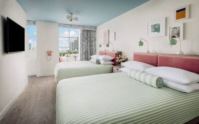 Day use twin room with lounge chairs and private bathroom at The Goodtime Hotel.