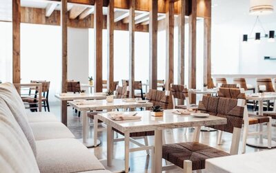 Dining room with comfortable seating, perfect for co-working at Cadillac Hotel & Beach Club, Autograph Collection.