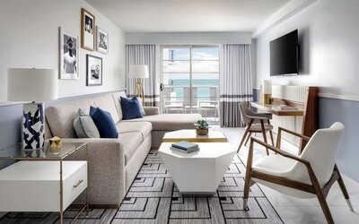 Day use suite' living and workspace area at Cadillac Hotel & Beach Club, Autograph Collection.