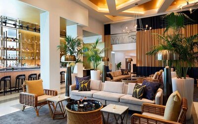 Lobby lounge area and workspace, perfect for co-working at Cadillac Hotel & Beach Club, Autograph Collection.
