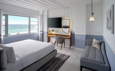 Standard day use room with queen bed, work desk and private bathroom at Cadillac Hotel & Beach Club, Autograph Collection.