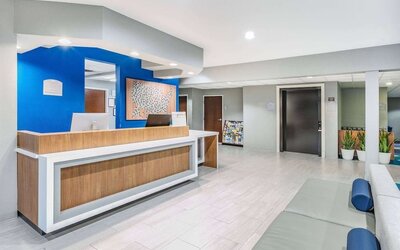 Reception desk at Microtel Inn And Suites By Wyndham Austin Airport.