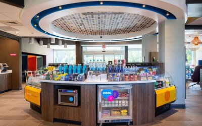 Reception and snack bar at Tru By Hilton Eugene.