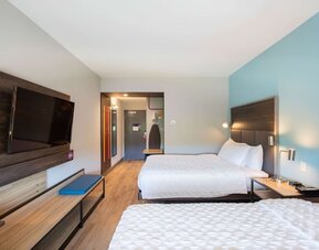 Day use room with TV and work desk at Tru By Hilton Eugene.