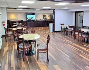 Dining area perfect for coworking at Studio 6 Baltimore West - Catonsville.