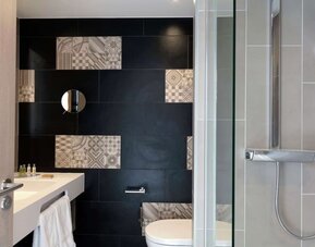 Guest bathroom at Hilton Garden Inn Massy.