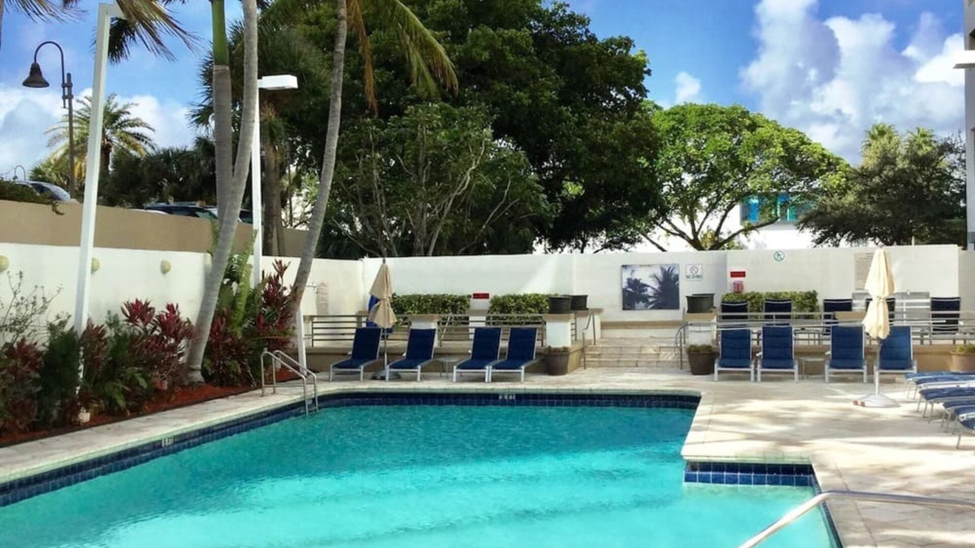 Outdoor pool at GALLERYone - A DoubleTree Suites By Hilton Hotel.