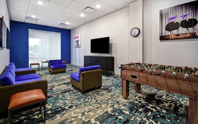 Coworking space and lounge at Home2 Suites By Hilton San Francisco Airport North.