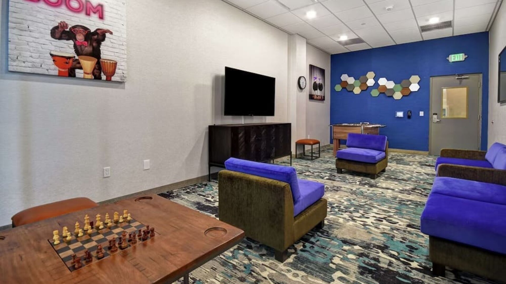 Coworking space and lounge at Home2 Suites By Hilton San Francisco Airport North.