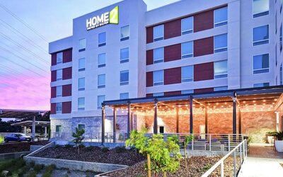 Hotel exterior at Home2 Suites By Hilton San Francisco Airport North.