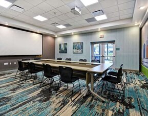 Meeting room at Home2 Suites By Hilton San Francisco Airport North.