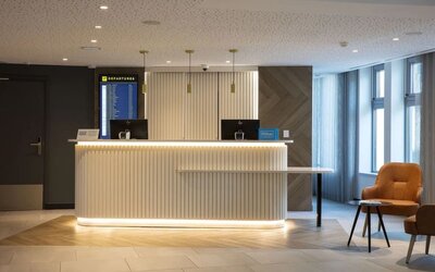 Reception desk at Hilton Garden Inn Paris Orly Airport.