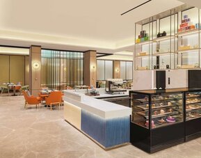 Restaurant at Hilton Garden Inn Surat City Centre.