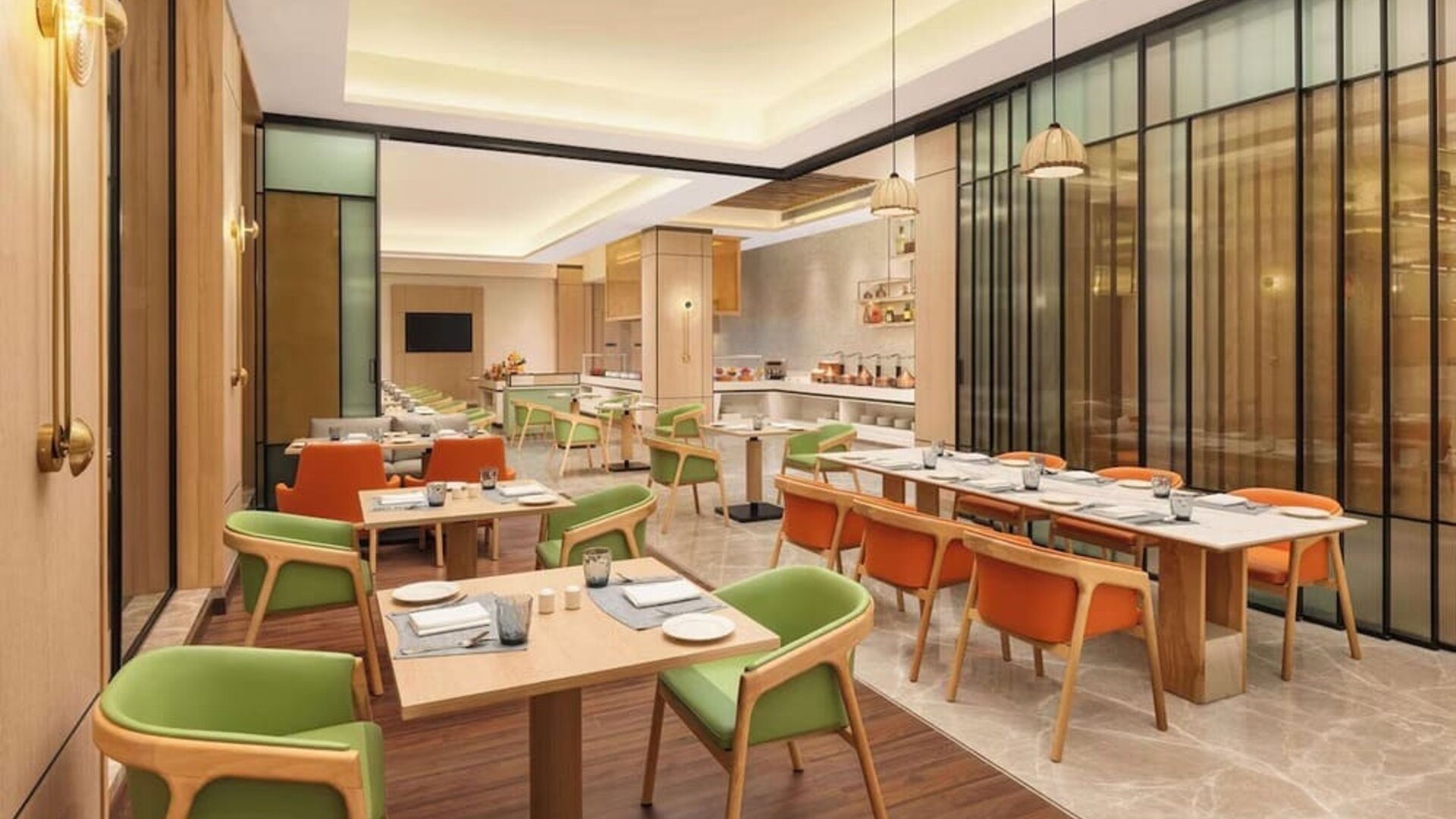 Dining area at Hilton Garden Inn Surat City Centre.