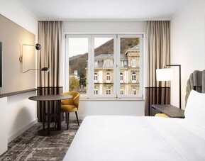 Day use room with TV at Hilton Heidelberg.