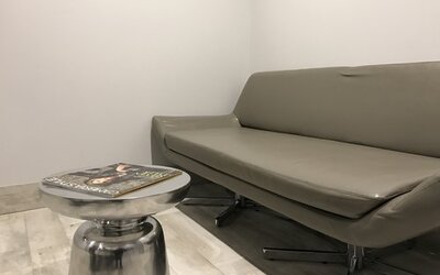 Sofa inside day use room at Ramsey Inn & Suites.