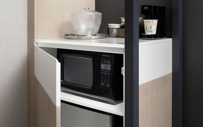 Microwave and bar fridge at SpringHill Suites By Marriott Milpitas.