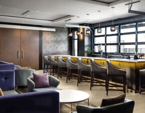 Lobby and lounge at SpringHill Suites By Marriott Milpitas.