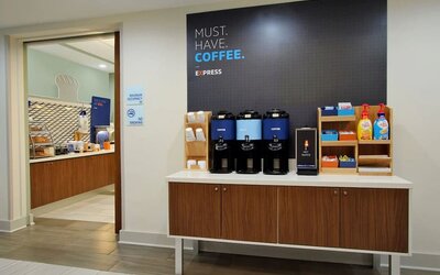 Coffee station at Holiday Inn Express Hotel & Suites Carlsbad Beach.