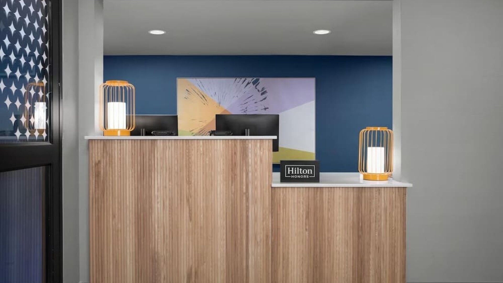 Reception desk at Spark By Hilton Tucson Airport.