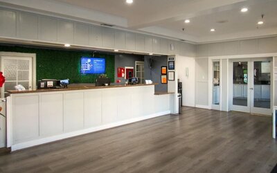 Reception desk at Capri Suites Anaheim.
