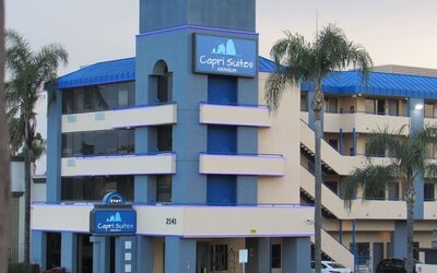 Hotel exterior at Capri Suites Anaheim.