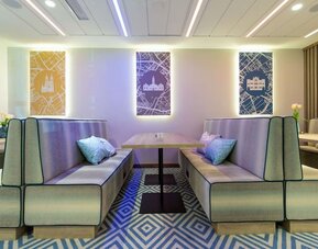 Lounge and coworking space at Hampton By Hilton Bialystok.