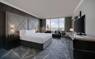 Day use room with work desk and sofa at Hilton Atlanta.