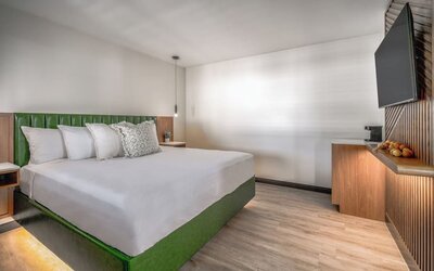 Day use room with TV and natural light at LYFE INN & SUITES By AGA.