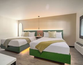 Day use room with TV and natural light at LYFE INN & SUITES By AGA.