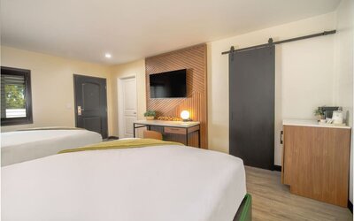 Day use room with TV and natural light at LYFE INN & SUITES By AGA.