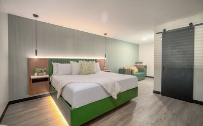 Day use room with TV and natural light at LYFE INN & SUITES By AGA.