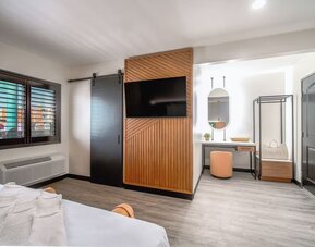 Day use room with TV and natural light at LYFE INN & SUITES By AGA.