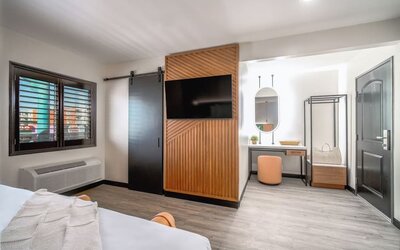 Day use room with TV and natural light at LYFE INN & SUITES By AGA.