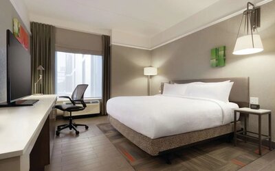 Spacious king room with work desk at Hilton Garden Inn Calgary Downtown.