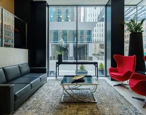 Lounge and coworking area at Arc The Hotel Ottawa.