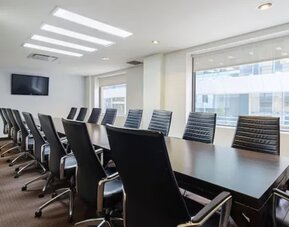 Meeting room with natural light at Arc The Hotel Ottawa.
