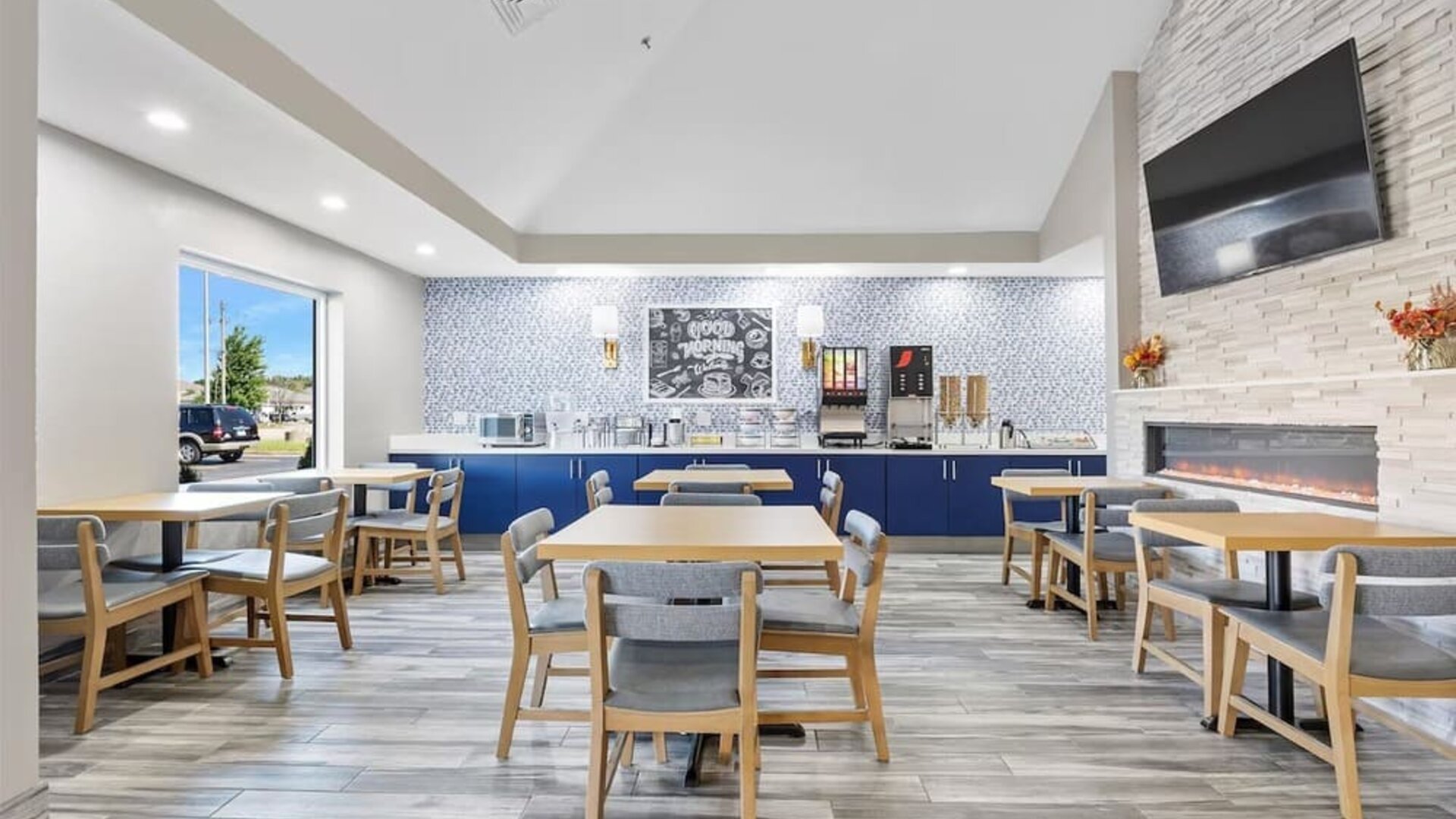 Dining room at AmericInn By Wyndham Urbana.