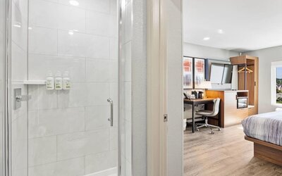 Guest bathroom at AmericInn By Wyndham Urbana.