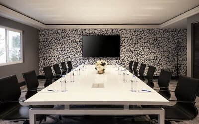 Professional meeting room with ergonomic chairs at Montrose At Beverly Hills.