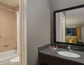 Guest bathroom at Super 8 By Wyndham Universal City.