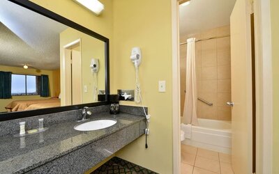 Guest bathroom at Super 8 By Wyndham Universal City.