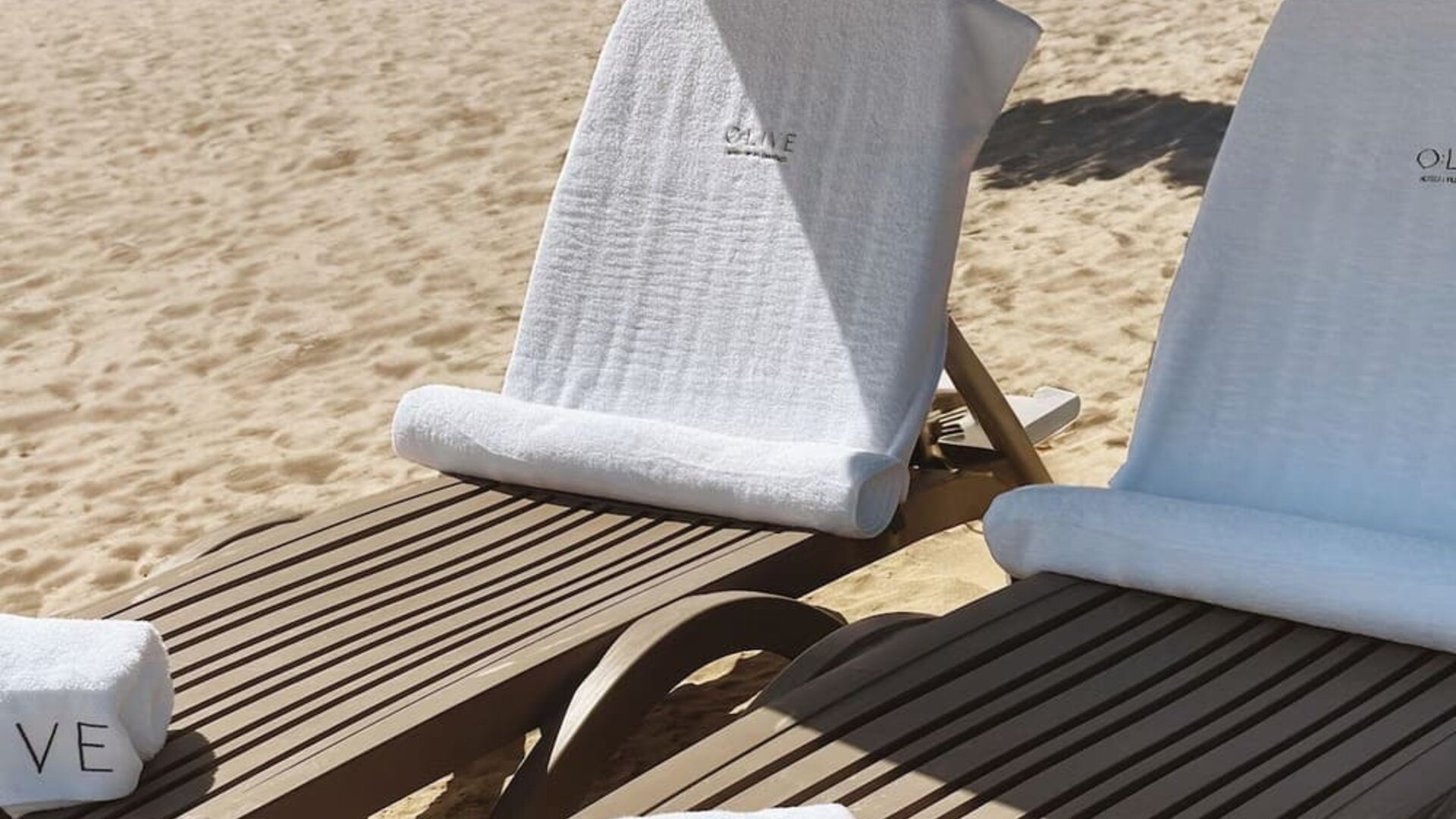 Beach loungers at Aire De O:live.