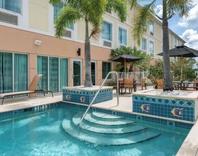 Outdoor pool at Sleep Inn & Suites Port Charlotte - Punta Gorda.
