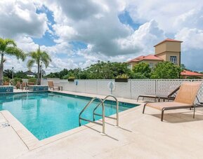 Outdoor pool at Sleep Inn & Suites Port Charlotte - Punta Gorda.