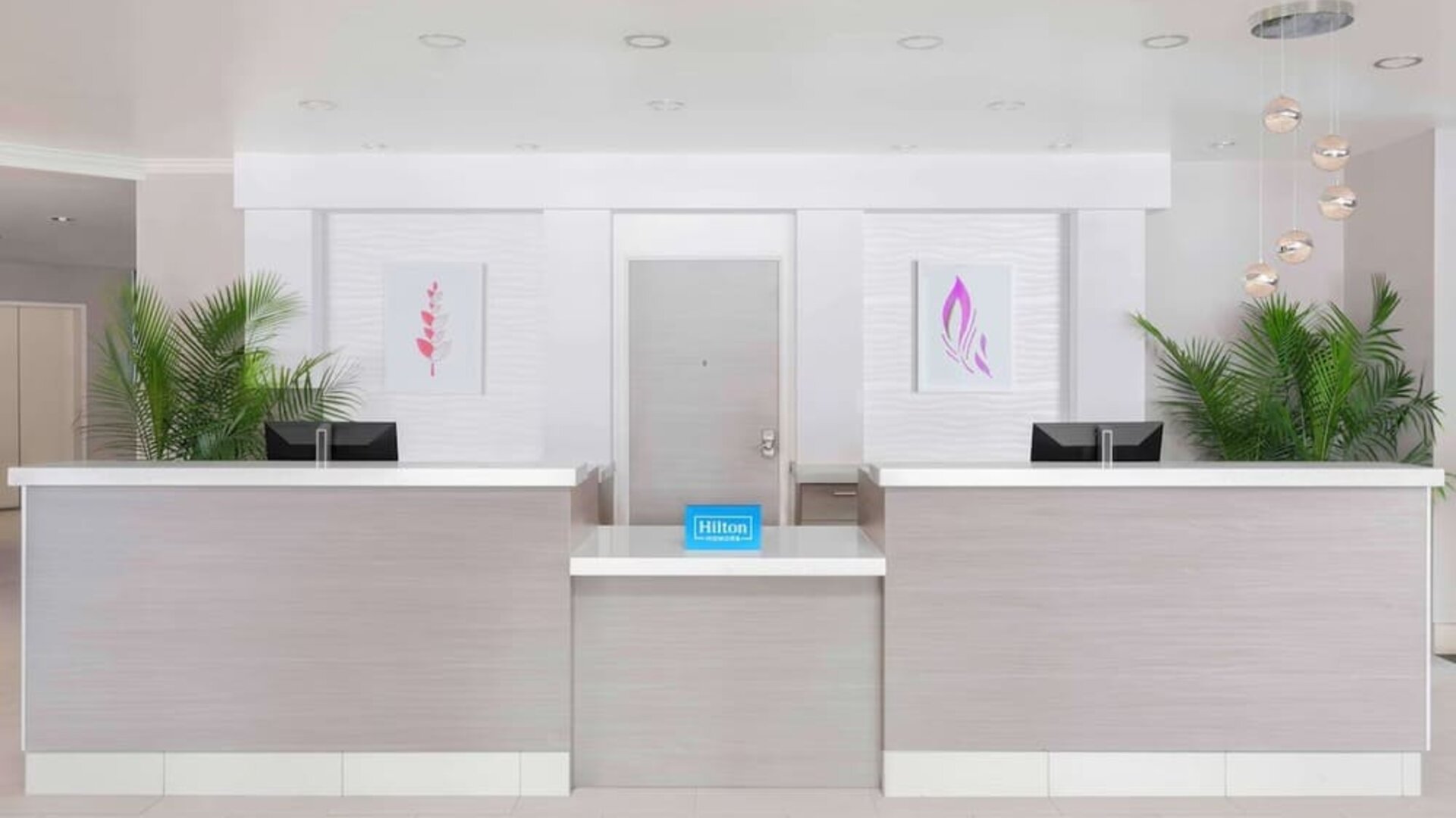 Front desk at Hilton Garden Inn Calgary Airport.