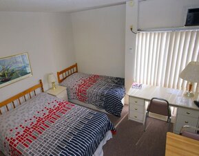 Bright and spacious day use twin room at Alexandra Hotel.