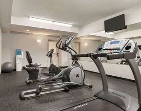 Fitness center at Days Inn By Wyndham London.